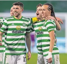  ??  ?? Celtic’s James Forrest celebrates after making it 1-0.
