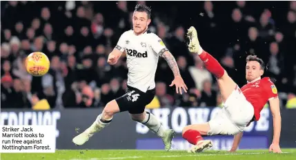  ??  ?? Striker Jack Marriott looks to run free against Nottingham Forest.