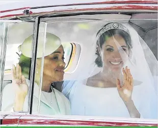  ?? PHOTO: GETTY IMAGES ?? Meghan Markle and her mother Doria Ragland drive down the Long Walk to Windsor Castle before her wedding to Prince Harry.