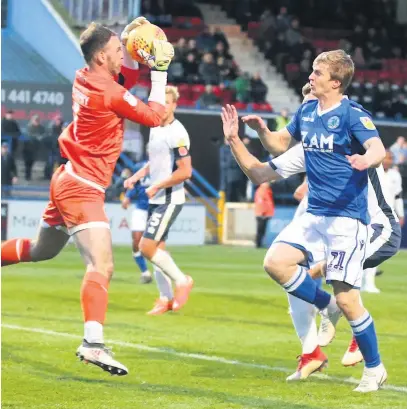  ?? Peter Hilton Photograph­y ?? Action from Macclesfie­ld’s heavy defeat against Bury at the Moss Rose