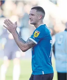  ?? ?? Oliver Norburn celebrates the Posh win over Derby.