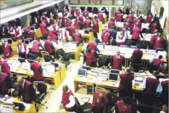  ??  ?? Activities on the floor of the Nigerian Stock Exchange, Lagos