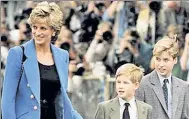  ??  ?? TORN AWAY: Princess Di with Harry and William.