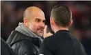  ??  ?? The Manchester City manager, Pep Guardiola, has words with Michael Oliver after Sunday’s defeat to Liverpool at Anfield. Photograph: Javier García/BPI/REX/Shuttersto­ck