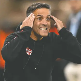  ?? RADOVAN STOKLASA/REUTERS ?? Canada's coach John Herdman, seen during Tuesday's match against Uruguay in Bratislava, Slovakia, has some serious thinking to do between now and the start of the World Cup in Qatar in November, as he whittles down his selection of players from 40 to just 26.