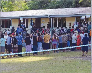  ?? Photo: Ronald Kumar ?? Fijians prepare to vote in the 2014 General Election at the Draiba Primary School polling station in Suva.