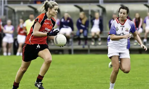  ??  ?? Karen Maloney St Mary’s in action with Orna O’Dowd of Eoghan Rua. Pic: Tom Callanan.