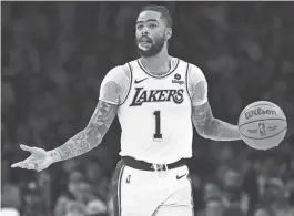  ?? GARY A. VASQUEZ/USA TODAY SPORTS ?? Lakers guard D’Angelo Russell controls the ball against the Cleveland Cavaliers during Saturday’s game in Los Angeles.