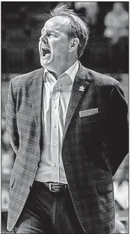  ?? AP file photo ?? Ole Miss Coach Kermit Davis said he expects a crowd of 15,000 to 18,000 in Walton Arena today when the Rebels take on the Razorbacks. “It’s going to be a tough, tough one at Arkansas,” Davis said. “That’s life in this league.”