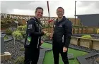  ?? ROB MAETZIG ?? Supercars legends Craig Lowndes and Greg Murphy faced off at Taranaki’s Mt Panorama mini-putt course on Tuesday.