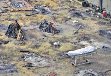  ?? AP ?? Funeral pyres of those who died of Covid-19 at a ground converted into a crematoriu­m in New Delhi.