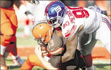 ?? GETTY IMAGES ?? Jason Pierre-Paul (90) of the Giants had sports hernia surgery Wednesday, ending his regular season with 53 tackles, seven sacks and three forced fumbles.
