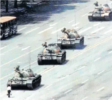  ?? Picture: REUTERS ?? LONE TOTEM OF COURAGE: A Beijing citizen stands in front of a column of tanks on the Avenue of Eternal Peace in this iconic photo taken during the crushing of the Tiananmen Square uprising