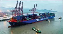  ?? YAO FENG / FOR CHINA DAILY ?? A COSCO container ship docks at Ningbo, Zhejiang province.