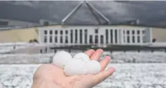  ??  ?? DAMAGE: Golf ball-sized hail at Parliament House.
