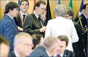  ?? VIRGINIA MAYO / POOL / EFE ?? Rajoy y Merkel el jueves en Bruselas