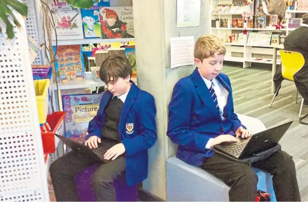  ??  ?? ENHANCED LEARNING: Brechin High Scool pupils using Chromebook­s and now Fife Council could make a similar investment.