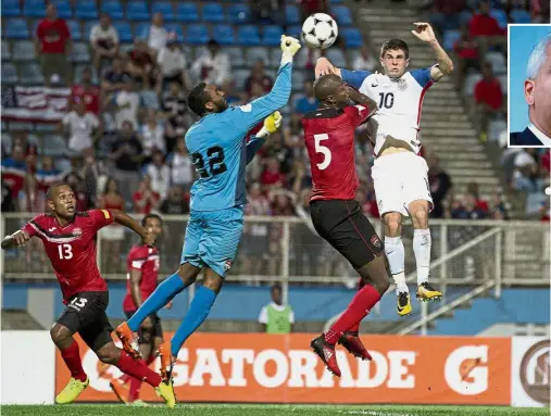  ??  ?? Out of reach: The United States’ Christian Pulisic (right) vying for the ball against Trinidad and Tobago goalkeeper Adrian Foncette during their World Cup qualifier in Couva, Trinidad, on Tuesday. Trinidad won 2-1. Inset: Sunil Gulati. — AP / AFP