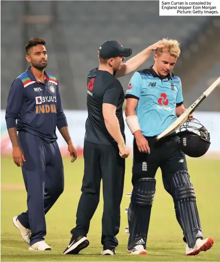  ??  ?? Sam Curran is consoled by England skipper Eoin Morgan
Picture: Getty Images.