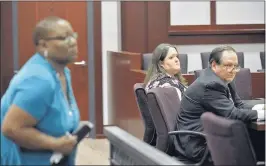  ?? BEAU CABELL/ASSOCIATED PRESS ?? Rachael Michelle Rapraeger (center) sits with her attorney, Floyd Buford, after Sharon Holmes read a statement during a sentencing hearing in Perry, Ga. Rapraeger pleaded guilty to charges of reckless conduct and computer forgery for falsifying...