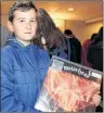  ?? JUANITA MERCER/THE TELEGRAM ?? Noah MacDonald, 10, was excited to purchase two new albums for his record collection at the Record Fair NL fall fair in St. John’s, N.L.