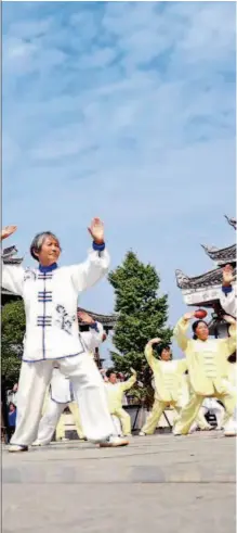  ??  ?? October 9, 2016: Seniors practice tai chi in Liping County, Guizhou Province. In 2017, newly added Chinese seniors exceeded 10 million for the first time. VCG