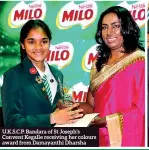  ??  ?? U.K.S.C.P. Bandara of St Joseph’s Convent Kegalle receiving her colours award from Damayanthi Dharsha