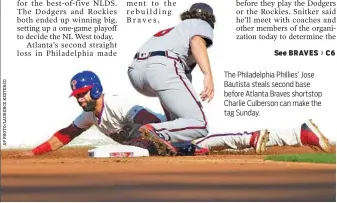  ??  ?? The Philadelph­ia Phillies’ Jose Bautista steals second base before Atlanta Braves shortstop Charlie Culberson can make the tag Sunday.