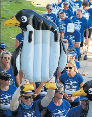  ?? Picture: MICHAEL PINYANA ?? See also page 4 Team Cape Town parade during the SA Masters swimming champs being held in East London another picture page 17 Report and