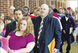  ?? Dan Henry ?? JOB GAINS in May were mostly in the service sector, which accounted for 95% of the new jobs, according to ADP. Above, job seekers at a career fair in Georgia.