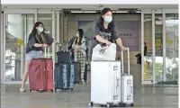  ?? Photo: IC ?? Passengers enter Hong Kong at the Shenzhen Bay Port in September, 2021.