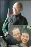  ?? Ng Han Guan/the Associated Press ?? Liu Xia, wife of 2010 Nobel Peace Prize winner Liu Xiaobo, had her first interview in more than two years at her home on Thursday.