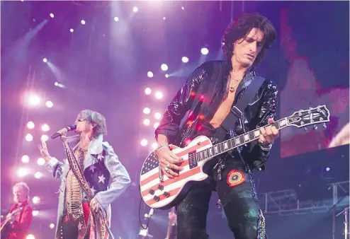  ?? — IMAGEDIREC­T FILES ?? Aerosmith is planning a residency in Las Vegas, which is proving inspiring to singer Steven Tyler, left, who says fans will be so close they will be able to feel lead guitarist Joe Perry’s sweat.