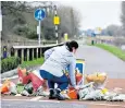  ?? ?? Flowers are laid near the murder scene on the banks of the Grand Canal in Tullamore