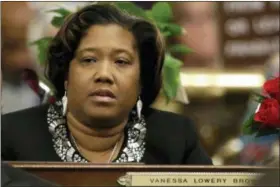  ?? MATT ROURKE — THE ASSOCIATED PRESS FILE ?? State Rep. Vanessa Lowery Brown, D-Philadelph­ia, sits at her desk at the state Capitol in Harrisburg, Pa. A county judge in Harrisburg on Friday sentenced Lowery Brown to 23 months of probation and $4,000 in restitutio­n for bribery and other charges.