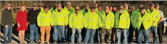  ?? Contribute­d ?? Walker County Road Department employees don high-visibility waterproof jackets purchased with grant funds.