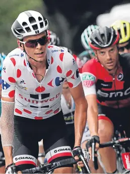  ?? Picture: AP. ?? France’s Warren Barguil, wearing the polka-dot jersey as best climber, tackles the Croix de Fer pass during the 17th stage of the Tour de France.