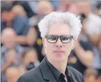  ?? CP PHOTO ?? In this May 16, 2016 file photo, director Jim Jarmusch poses for photograph­ers during a photo call for the film “Paterson” at the 69th internatio­nal film festival in Cannes, southern France.