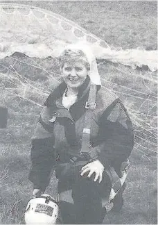  ??  ?? Safe landing Sister Catherine began her adventures with a parachute jump nearly 25 years ago and went on to try out paraglidin­g over Tinto Hill in 1996