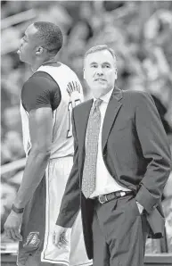  ?? Ross D. Franklin / Associated Press ?? Mike D’Antoni, right, has experience coaching Dwight Howard, having guided the Lakers during Howard’s one season in Los Angeles.