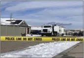  ?? SAM METZ — THE ASSOCIATED PRESS ?? Police continue their investigat­ion at a home where eight family members were found dead in Enoch, Utah, on Thursday.