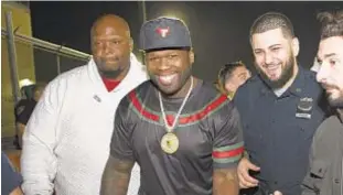  ?? GREGG VIGLIOTTI ?? Rapper 50 Cent (center) slammed the Brooklyn precinct commander who allegedly ordered officers to “shoot him on sight.”