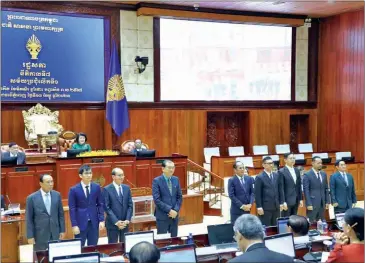  ?? NA ?? The National Assembly re-elects Prach Chan (far left) as chair of the NEC on December 13.