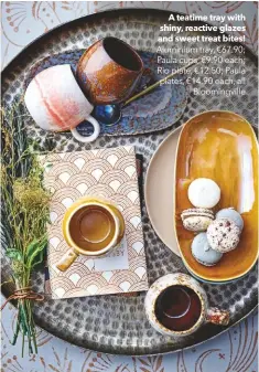  ??  ?? A teatime tray with shiny, reactive glazes and sweet treat bites! Aluminium tray, €67.90; Paula cups, €9.90 each; Rio plate, €12.50; Paula plates, €14.90 each, all Bloomingvi­lle