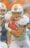  ?? STAFF PHOTO BY C.B. SCHMELTER ?? Tim Jordan carries the football during Tennessee’s spring game on April 13, 2019, at Neyland Stadium. Jordan, who was arrested last month in Florida, has been kicked off the team.