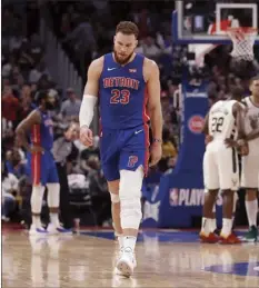  ?? AP photo ?? The Pistons’ Blake Griffin walks to the bench after fouling out during the fourth quarter Monday.