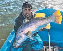  ??  ?? Adam Finlay, here with a fine barra, is looking forward reopening his fishing charter business in the coming months.