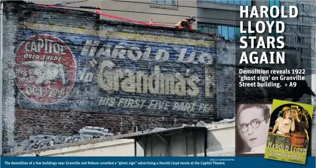  ?? JENELLE SCHNEIDER/ PNG ?? The demolition of a few buildings near Granville and Robson unveiled a “ghost sign” advertisin­g a Harold Lloyd movie at the Capitol Theatre.