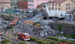  ?? PICTURE: ANSA/AFRICAN NEWS AGENCY/ANA ?? Worker remove rubble from the partially collapsed Morandi bridge in Genoa, Italy, yesterday. Italian authoritie­s, worried about the stability of remaining large sections of the bridge, evacuated about 630 people from nearby apartments.