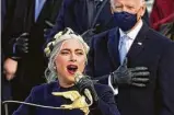  ?? Andrew Harnik / Associated Press ?? Lady Gaga performs the national anthem to help get the ceremonies started Wednesday.